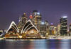 Australia Targets High-Risk Crypto Cash Channels Sydney Opera House at night with city skyline.