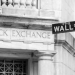 Inside Trump’s 3,700 Trades: Outrage vs. Evidence Stock Exchange building and Wall Street sign.