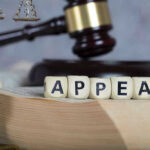 Court Map Decision Victory Blocks spelling appeal with gavel and balance scales.