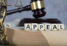 Blocks spelling appeal with gavel and balance scales.