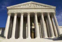 Systemic Failures in Grooming Gang Abuse Cases Facade of the Supreme Court building featuring tall columns and intricate carvings