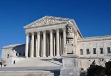Nuns Threatened: DOJ Steps Into Explosive Gender Care Fight The Supreme Court building with large columns and a clear blue sky