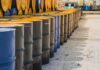 Rows of oil barrels in a storage facility