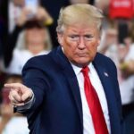 Leader’s Duel Puts Corruption Back in the Spotlight A man in a suit pointing during a speech at a rally