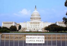 Meta Faces Backlash Over Rule Changes View of the U.S. Capitol building with a security barrier in front