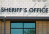 Massachusetts Sheriff Frees Gun Suspect Sheriffs Office sign on brick building faade.