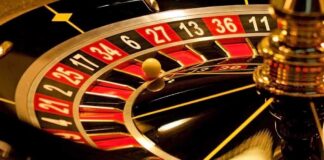 Close-up of a roulette wheel with a spinning ball