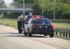 28-Year-Old Migrant Dies in Florida Highway Crash Police officer conducting a traffic stop on a highway