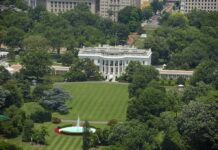 White House south lawn with fountain and surrounding trees