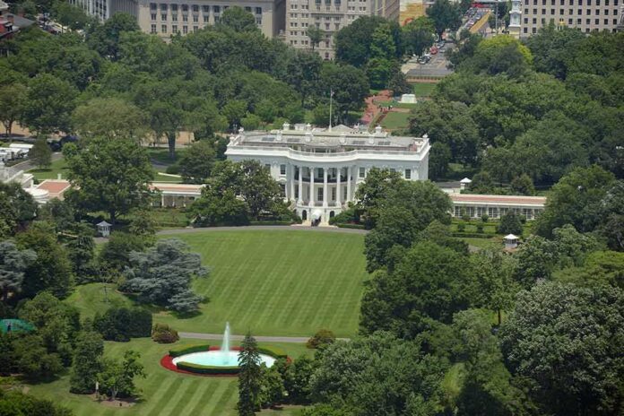shutterstock_232211959-1 White House south lawn with fountain and surrounding trees