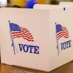 Late Ballots Flip LA Power voting booth with American flag graphics