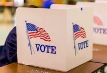 Late Ballots Flip LA Power voting booth with American flag graphics