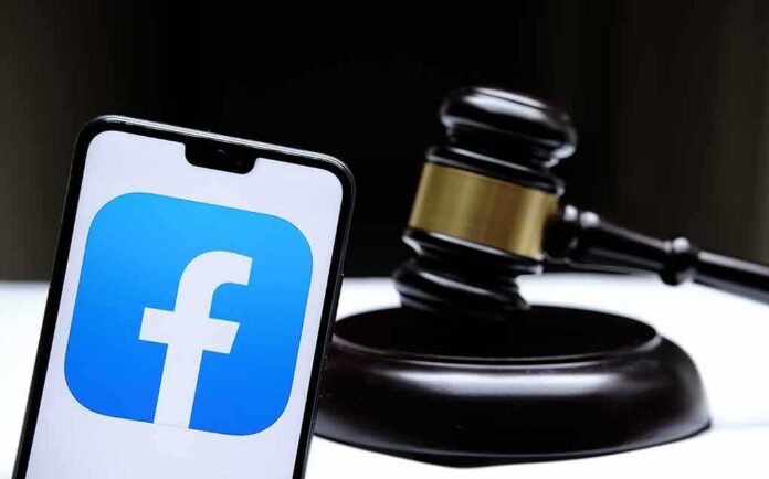 Smartphone with Facebook app logo beside a judge’s gavel