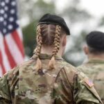 Top U.S. Europe General Steps Down Early soldier in camouflage with braided hair and beret