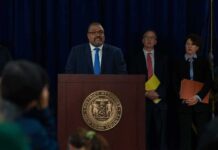 Judge’s Son Arrested After Past Rape Convictions Man at podium during press conference