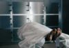 Body on a morgue gurney with toe tag
