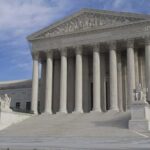 Supreme Court building with grand columns and steps