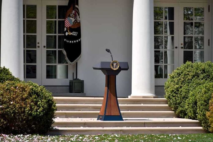 shutterstock_1070010710-3 Podium with presidential seal in a garden colonnade