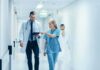 Ohio Hospital Faces Wrong-Site Surgery Lawsuit Doctor and nurse walking in a hospital corridor reviewing a tablet