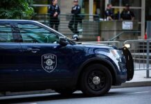 Seattle Employers Demand More Cameras Seattle Police SUV parked on a city street