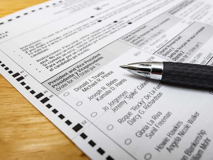 shutterstock_1824882338-1 Ballot paper with pen on wooden surface
