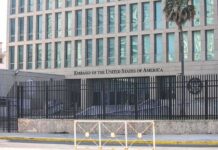 Trump’s Iran Policy Faces Saudi Pushback Embassy building behind tall black security fence