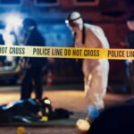Police tape at nighttime crime scene