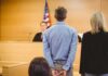 Cyber Tips Trigger Major Jonesboro Raid Defendant in handcuffs standing before a judge in a courtroom