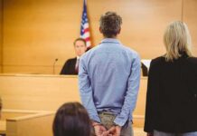 Cyber Tips Trigger Major Jonesboro Raid Defendant in handcuffs standing before a judge in a courtroom