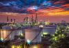 China’s Russian Oil Premiums Hit Record Highs Oil refinery with storage tanks at sunset