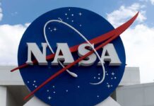 NASA Warns: Heat Dome SLAMS Millions NASA logo on a large blue circular sign