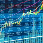 Stock market chart with rising candlesticks and trend lines