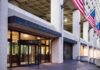 J. Edgar Hoover FBI Building entrance with American flags