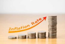 Rising Energy Costs Echo 1970s Inflation stacks of coins increasing with upward arrow
