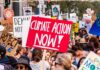 “Oh, Shut Up”: Maine Senate Debate Turns Heated Crowd at climate protest holding signs
