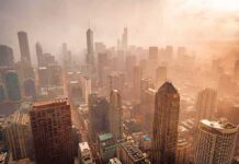 City skyline in warm haze at sunset